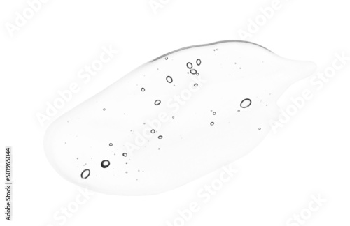 Face serum texture. White clear liquid gel drop isolated on white background. Skincare beauty product swatch with bubbles closeup photo