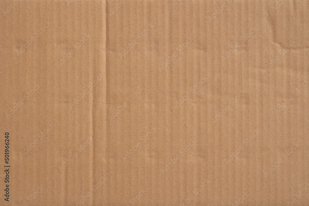 Fototapeta premium Old cardboard background with folds and creases.