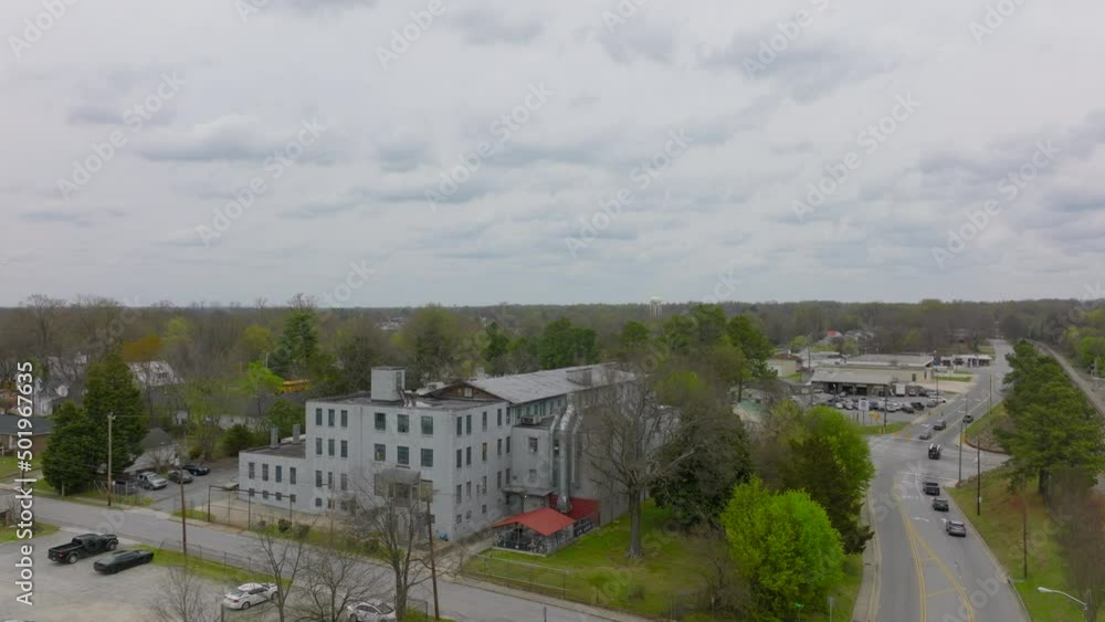 Flyover factory building in Thomasville, North Carolina on a pretty overcast day. Flyover factory building in Thomasville, North Carolina on a pretty overcast day.