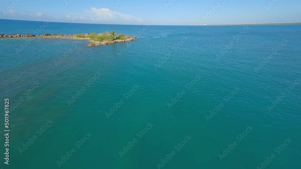 Drone fpv flying around small Caribbean island in middle of sea near Playa Nueva Romana beach, Dominican Republic Drone fpv flying around small Caribbean island in middle of sea near Playa Nueva Romana beach, Dominican Republic