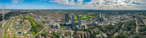 Panoramic aerial drone view of Liverpool in Greater Western Sydney, New South Wales, Australia looking west showing the high rise residential apartments