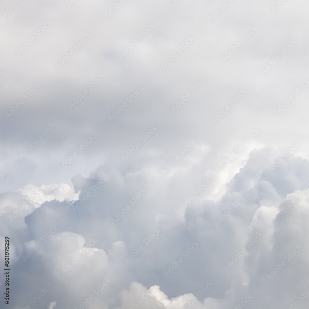 Fototapeta premium Cloudy sky background. Sunlight shining through white clouds.
