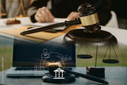 Billede på lærred Judge gavel and legal book on wooden table, justice and law concept