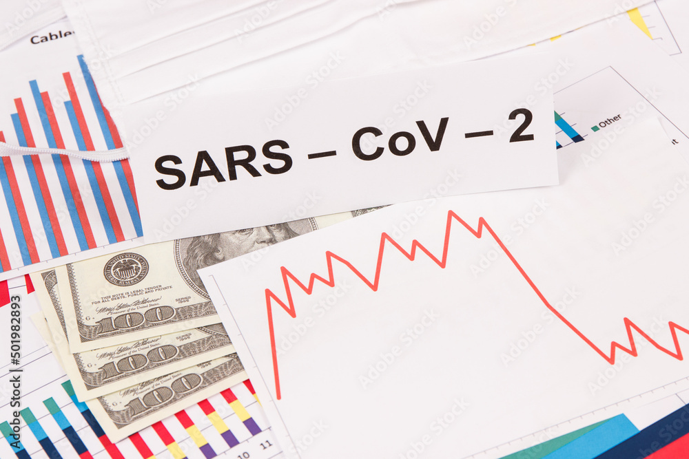Currencies dollar with downward graphs representing financial crisis caused by coronavirus. Covid-19 Currencies dollar with downward graphs representing financial crisis caused by coronavirus. Covid-19