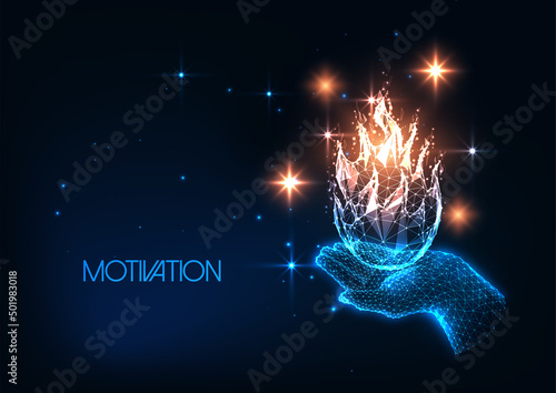 Futuristic motivation concept with glowing low polygonal human hand holding flame 