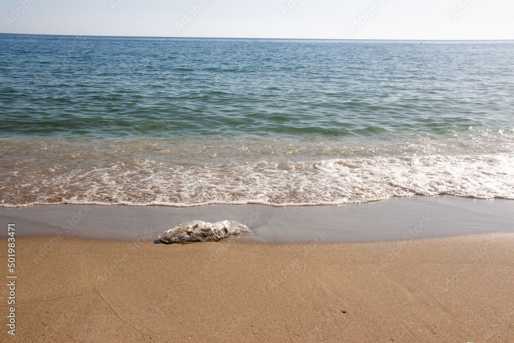 Plastic rubbish on the beach , environmental pollution Plastic rubbish on the beach , environmental pollution