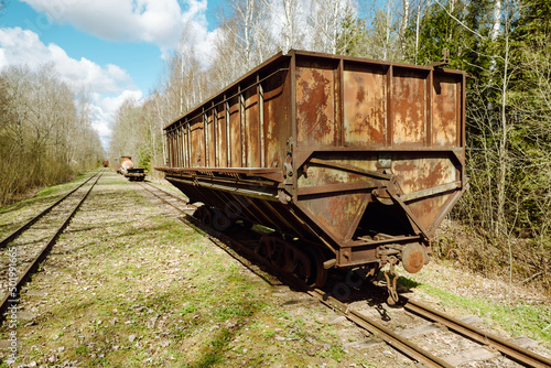 Peat mining company narrow-gauge railway. Railway track near the factory yard photo