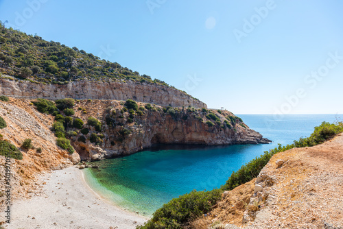 Fototapeta Naklejka Na Ścianę i Meble -  Bay on the Mediterranean coast of Turkey. Turquoise sea water. Sand beach. Lycian trail.