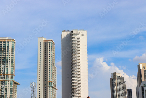 luxury apartment building with beautiful blue sky background.