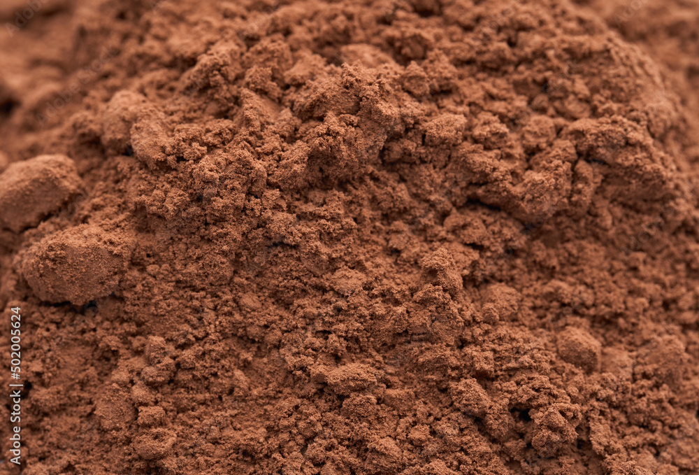 Pile of Cocoa powder isolated on white background. Pile of Cocoa powder isolated on white background.