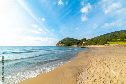 Fototapeta Naklejka Na Ścianę i Meble -  Blue sky with small clouds over La Speranza beach in springtime