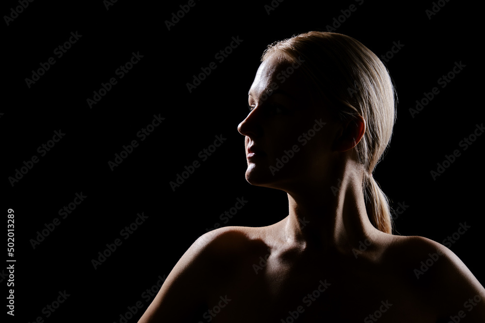 topless woman on black