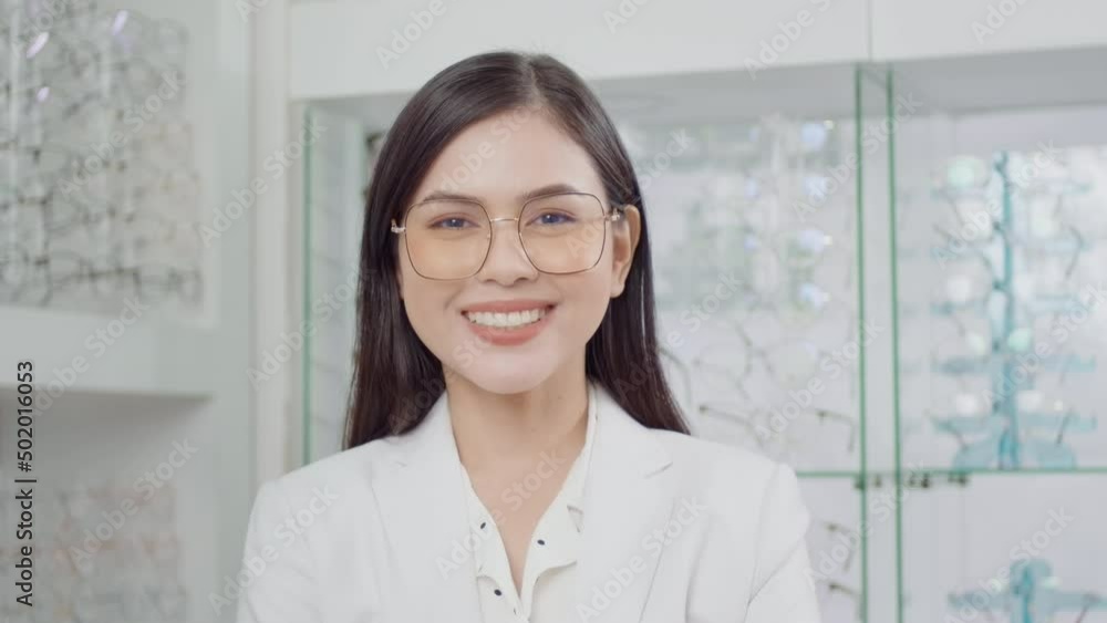 Portrait of ophthalmologist in optical center, eyecare concept. Portrait of ophthalmologist in optical center, eyecare concept.