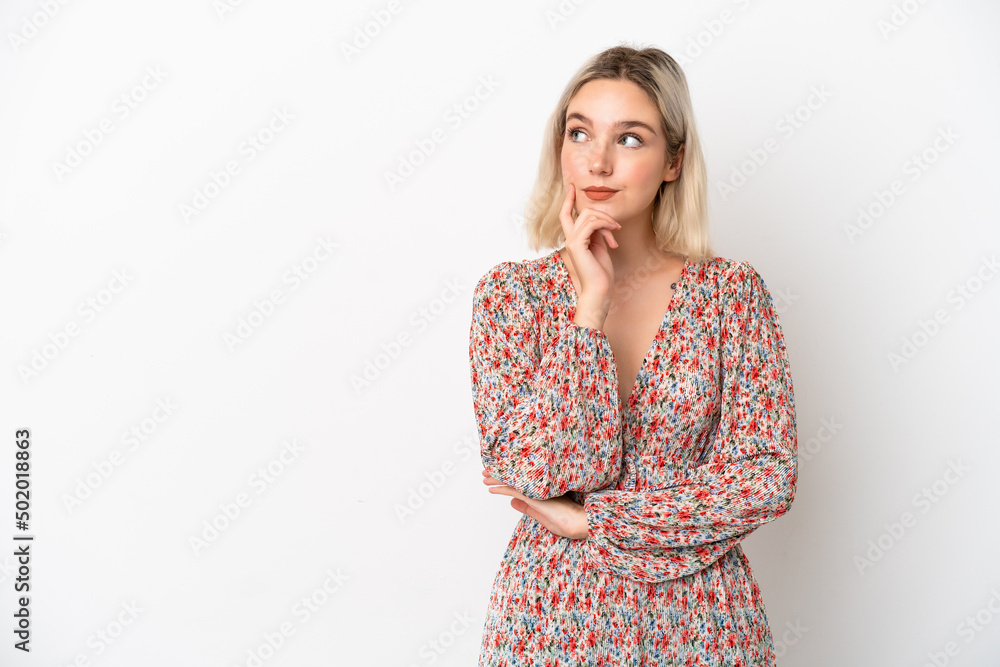 Young caucasian woman isolated on white background thinking an idea while looking up Young caucasian woman isolated on white background thinking an idea while looking up