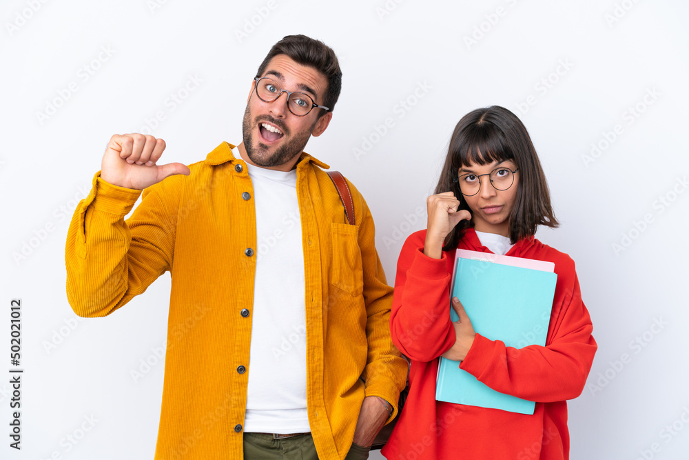 Young student couple isolated on white background proud and self-satisfied in love yourself concept