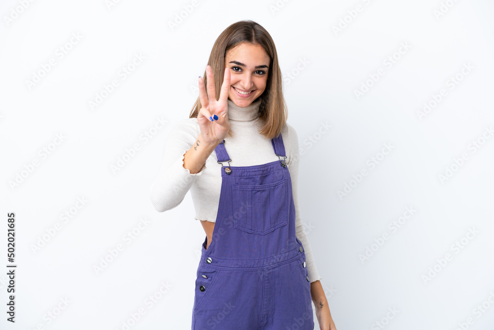 Young caucasian woman isolated on white background happy and counting three with fingers Young caucasian woman isolated on white background happy and counting three with fingers