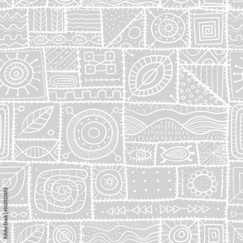 Sewn pieces of fabric in a patchwork style. Ethnic Ornament for your design.