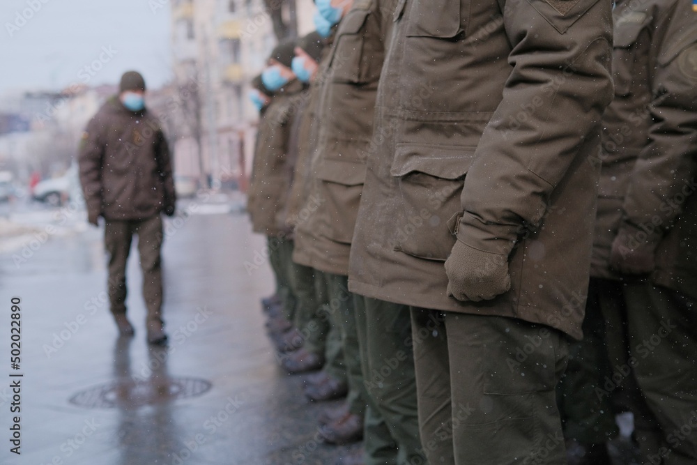 Soldiers of Ukrainian army are standing in the town uniform. Soldiers of Ukrainian army are standing in the town uniform.