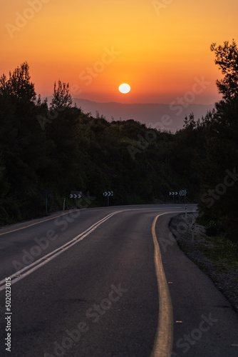 Road on Mount Gilboa as the sun goes down on a peaceful evening in Israel 