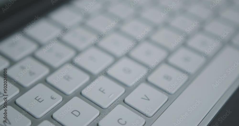 Camera flight macro shot over modern computer keyboard Camera flight macro shot over modern computer keyboard