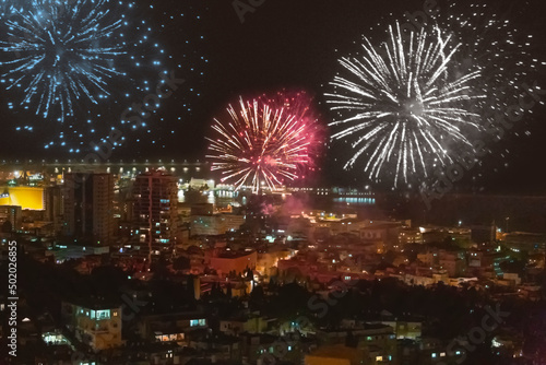 Blurred background with Fireworks in Haifa on Independence Day. Israel on yom haatzmaut. Firework Display At Night. Concept of freedom, memory and patriotism. Yom Ha'Atzmaut, Israeli Independence Day