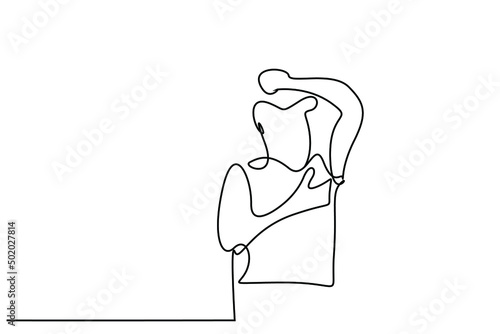 a person smelling armpits raises their arms and looks