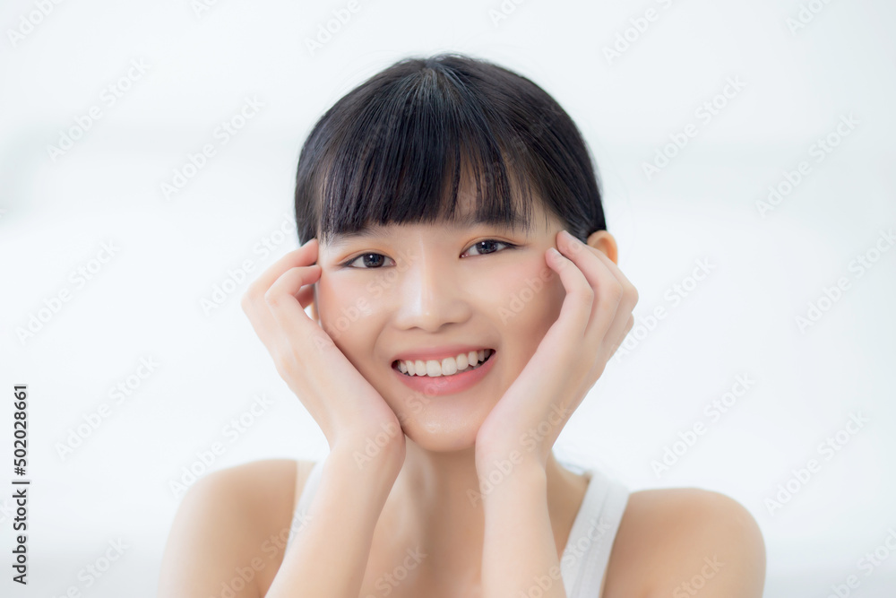 Beautiful young asian woman makeup of cosmetic, girl hand touch cheek on face and smiling attractive, facial of beauty perfect skincare with wellness and wrinkle, skin care and health concept. Beautiful young asian woman makeup of cosmetic, girl hand touch cheek on face and smiling attractive, facial of beauty perfect skincare with wellness and wrinkle, skin care and health concept.