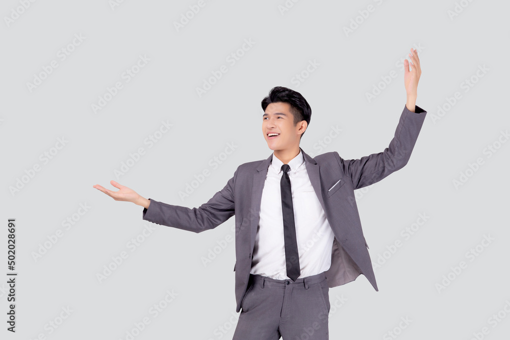 Portrait businessman in suit standing with win success isolated on white background, young asian business man is manager or executive having confident and excited is positive, expression and emotion. Portrait businessman in suit standing with win success isolated on white background, young asian business man is manager or executive having confident and excited is positive, expression and emotion.