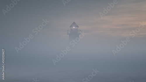 The lighthouse rises from the mist. Atmospheric landscape