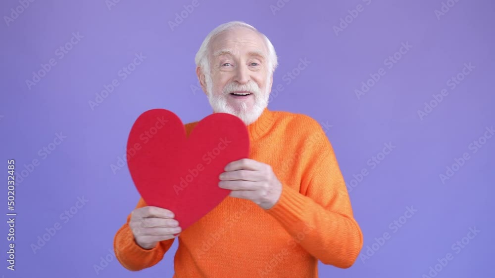Aged man dancing card heart isolated bright color background Aged man dancing card heart isolated bright color background