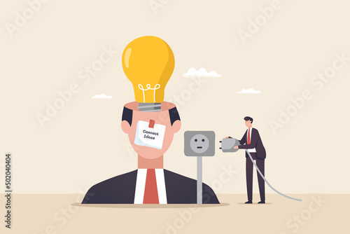 Big idea concept, connect idea. Generates creative ideas and brainstorming metaphor. .great innovation for business. .A businessman connects a light bulb to start an action plan.