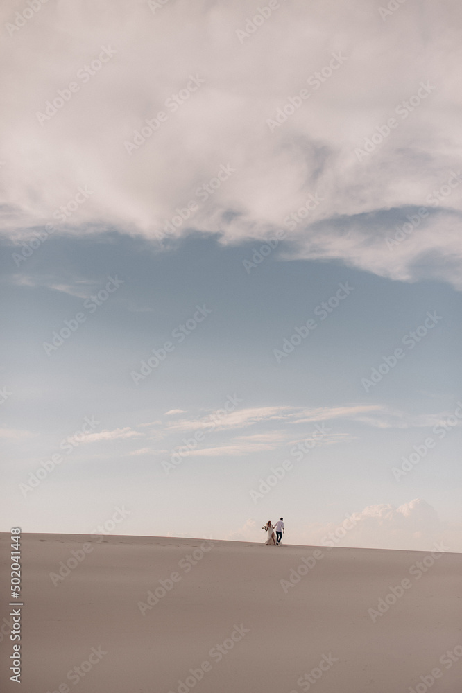 couple walking on the beach