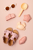 Kids summer accesories for sunny days and vacations. Sunglasses, sandals, sand molds for beach fun time