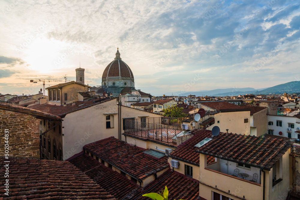 view of Florence, Italy and cathedral from a window with flowers 