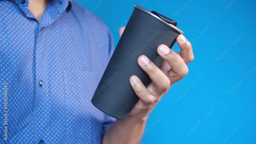 holding reusable eco coffee cup holding reusable eco coffee cup