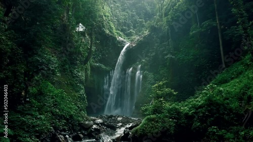 Dreamy waterfall in deep jungle of Lombok photo