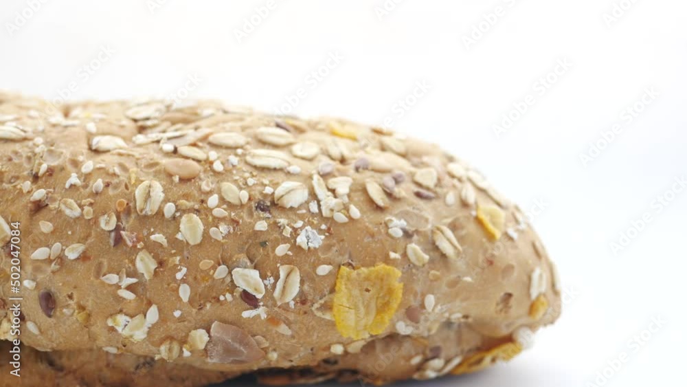 detail shot of whole grain baked bread on table detail shot of whole grain baked bread on table