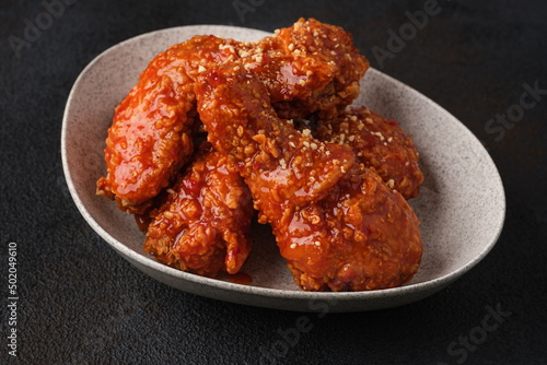 Korean fried chicken in spicy sauce