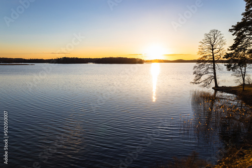 The colorful sky and water in the lake reflected at sunset