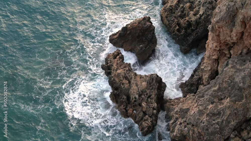 sea waves crashing against the rocks sea waves crashing against the rocks