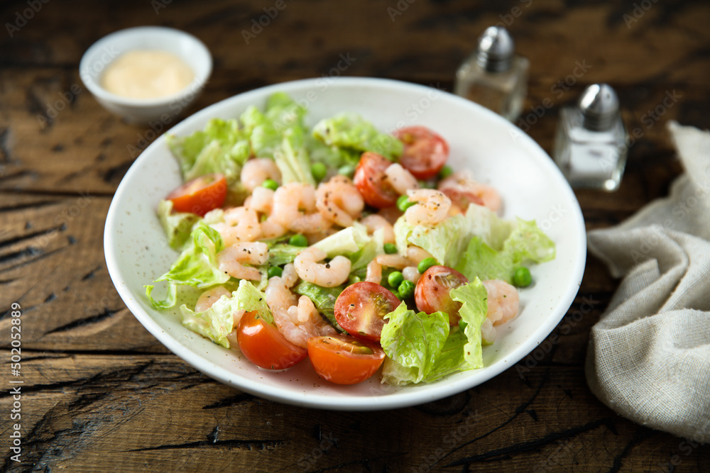 Leaf salad with cherry tomatoes and shrimps Leaf salad with cherry tomatoes and shrimps