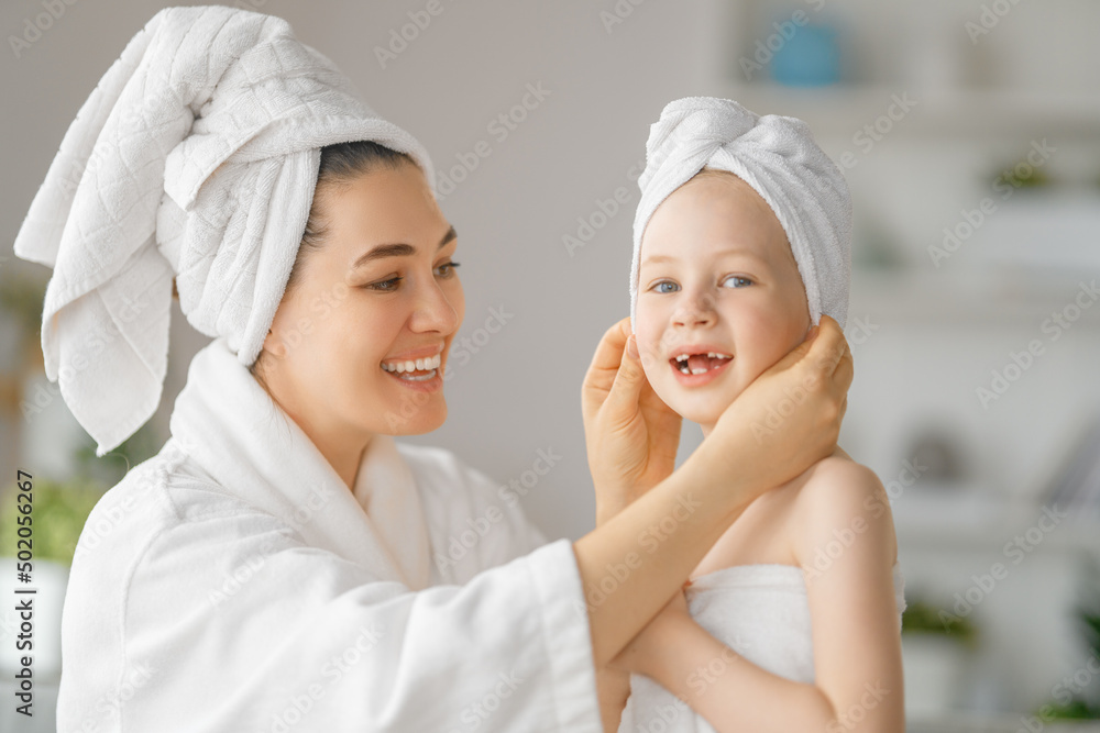 Mother and daughter after a bath Mother and daughter after a bath