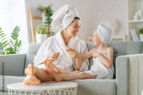 Mother and daughter after a bath