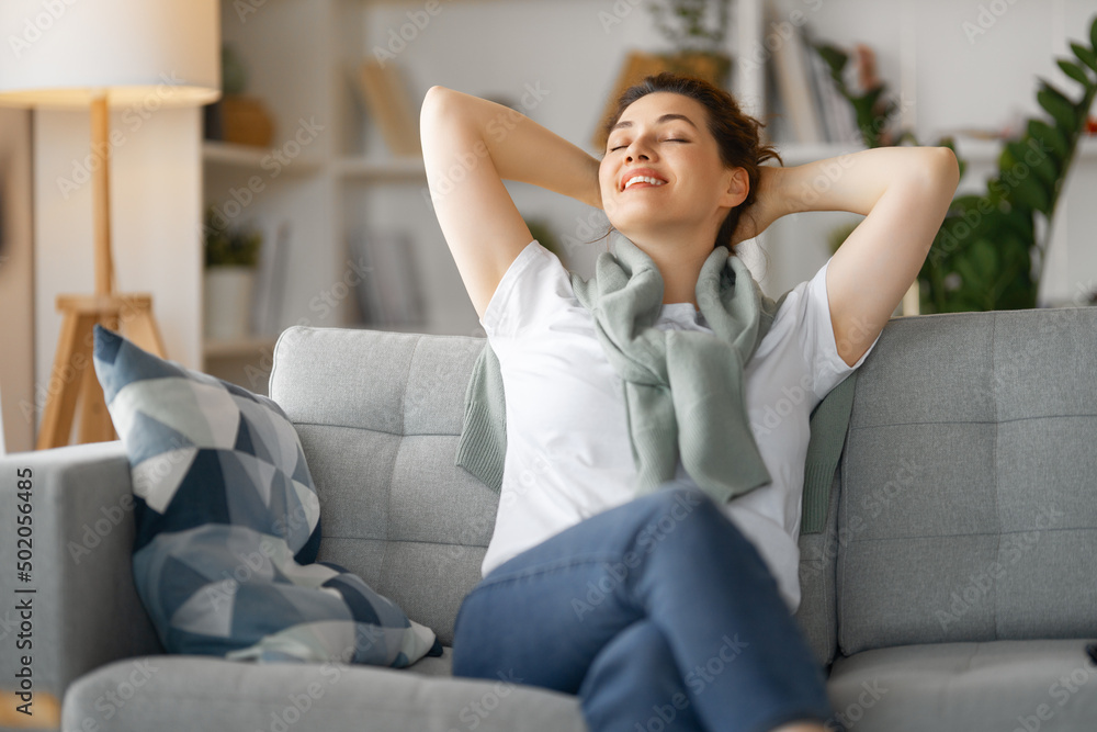 Fototapeta premium woman resting on a sofa