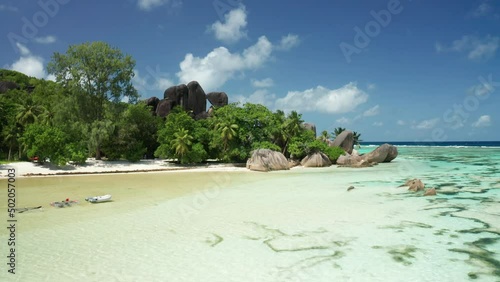 Aerial arc shot around Anse Source d'Argent beach, La Digue Seychelles