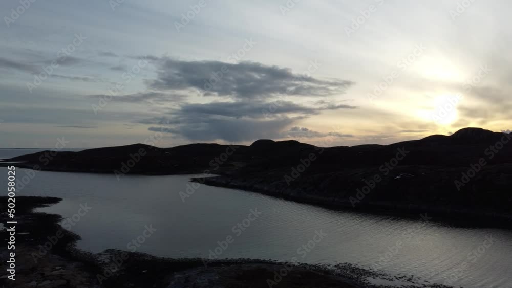 sunset over parts of the massive archipelago on the heroy island in nordland, northern Norway sunset over parts of the massive archipelago on the heroy island in nordland, northern Norway