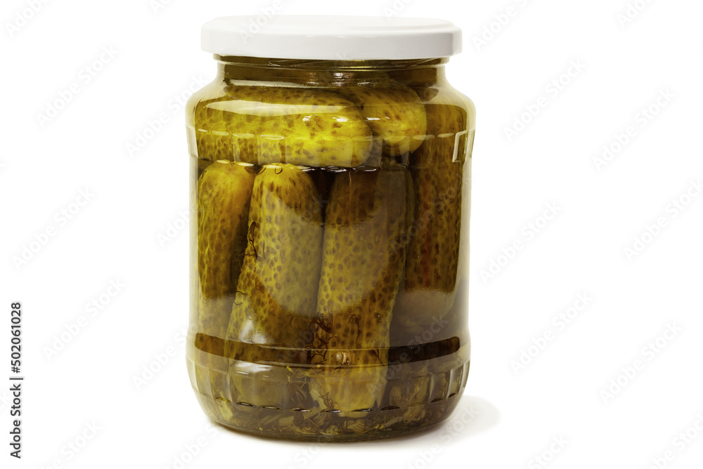 Canned cucumbers in a glass jar on a white background Canned cucumbers in a glass jar on a white background