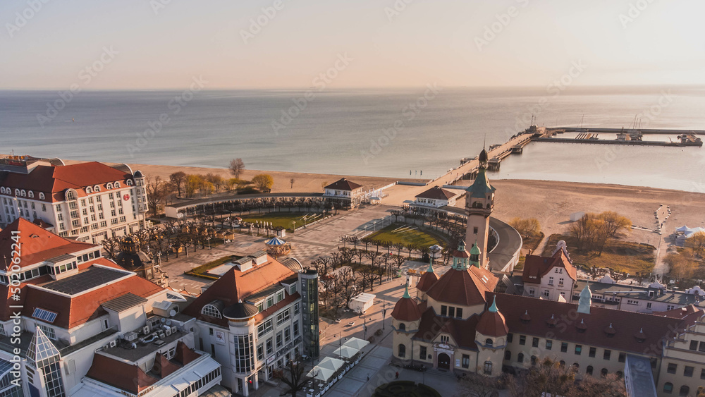 Morning view of the pier in Sopot, lighthouses and the Baltic Sea. View from the drone.