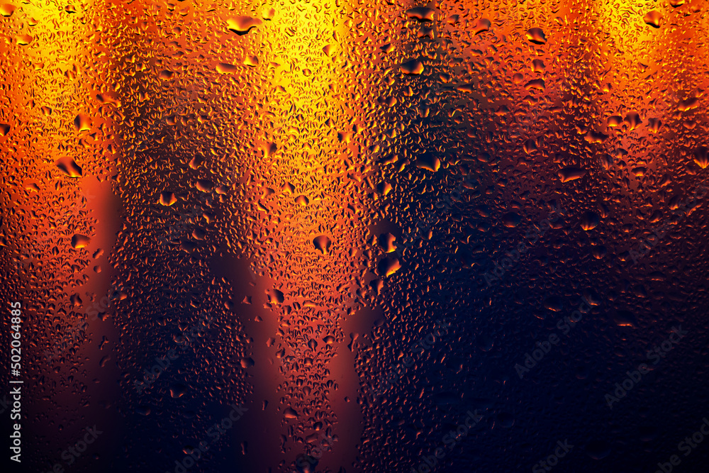 Condensation on the clear glass window. Water drops. Rain. Abstract background texture Condensation on the clear glass window. Water drops. Rain. Abstract background texture