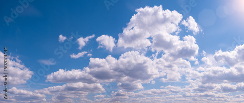 blue sky background with tiny clouds © Aleksandr Matveev
